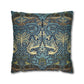 Decorative pillow with intricate blue and gold pattern on a white background
