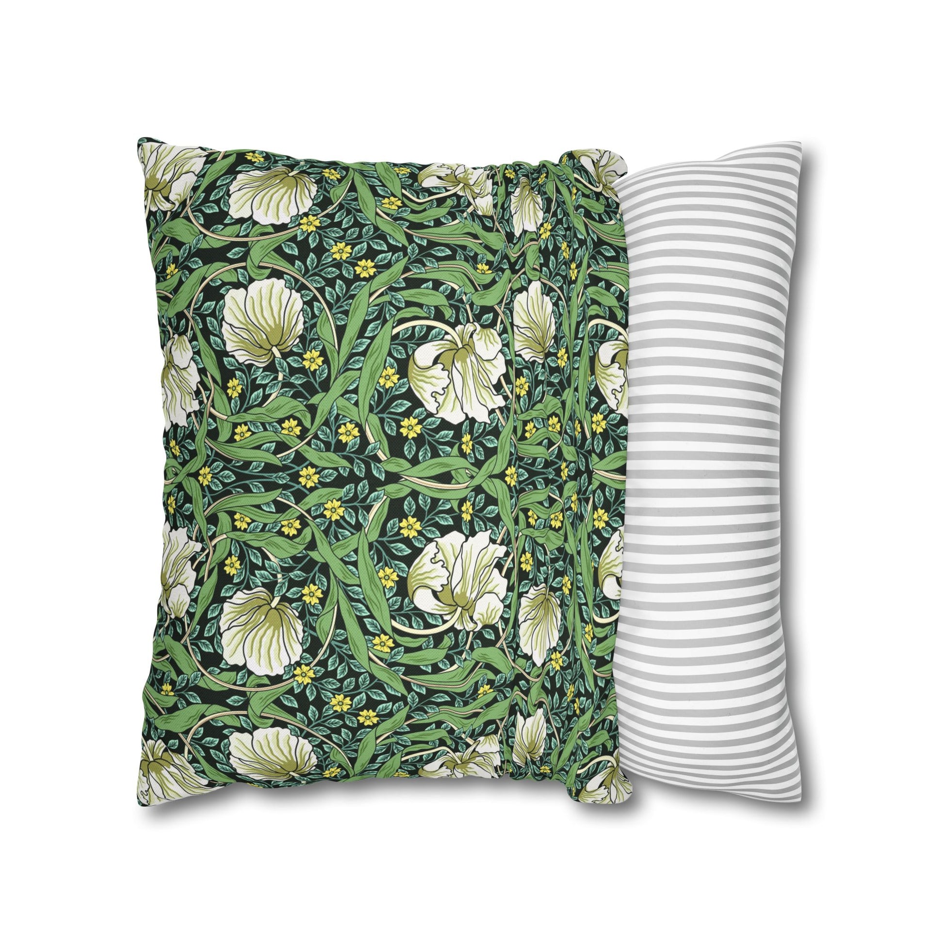 Two pillows, one with floral pattern and one with stripes, on a white background