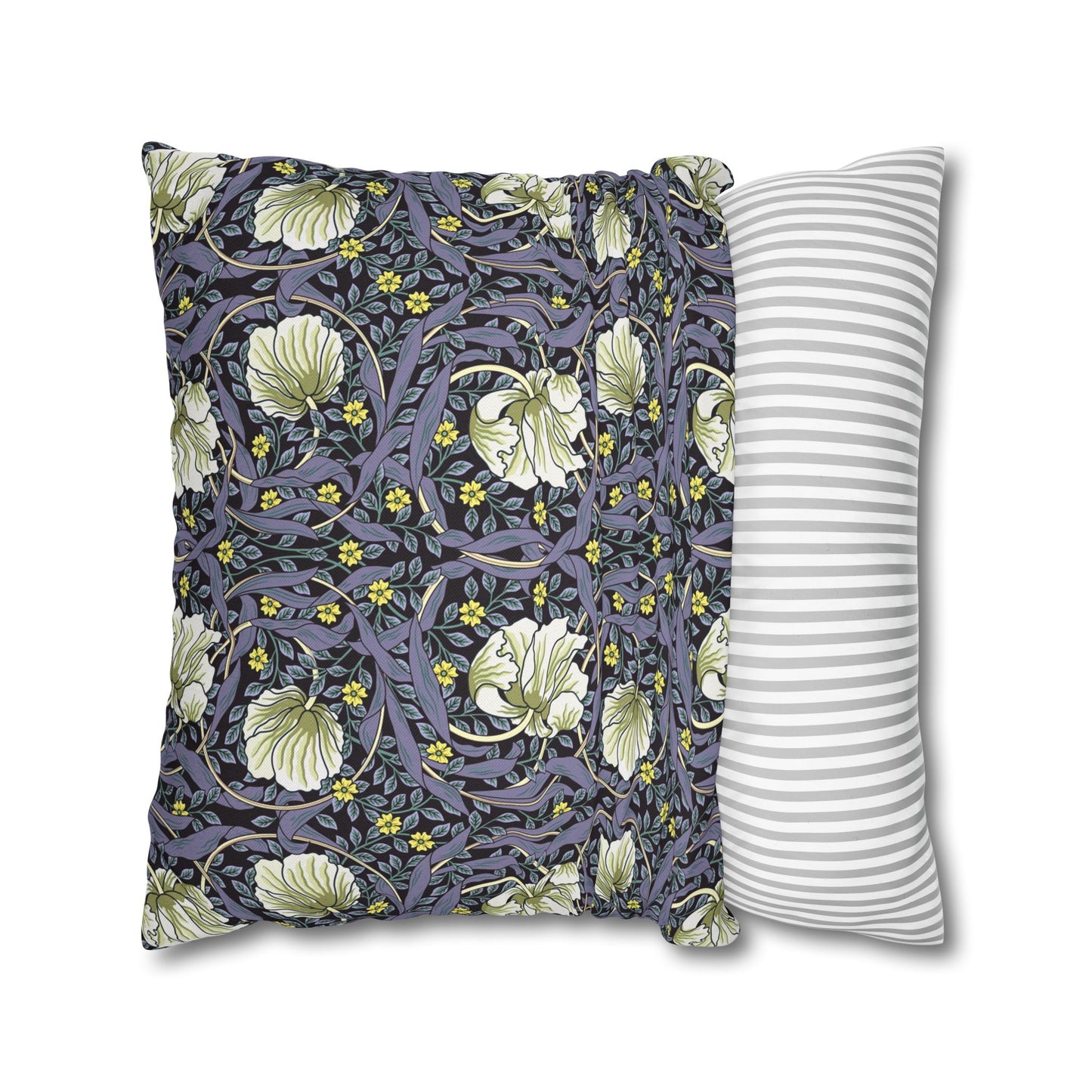 Two pillows, one with floral pattern and one with stripes, on a white background