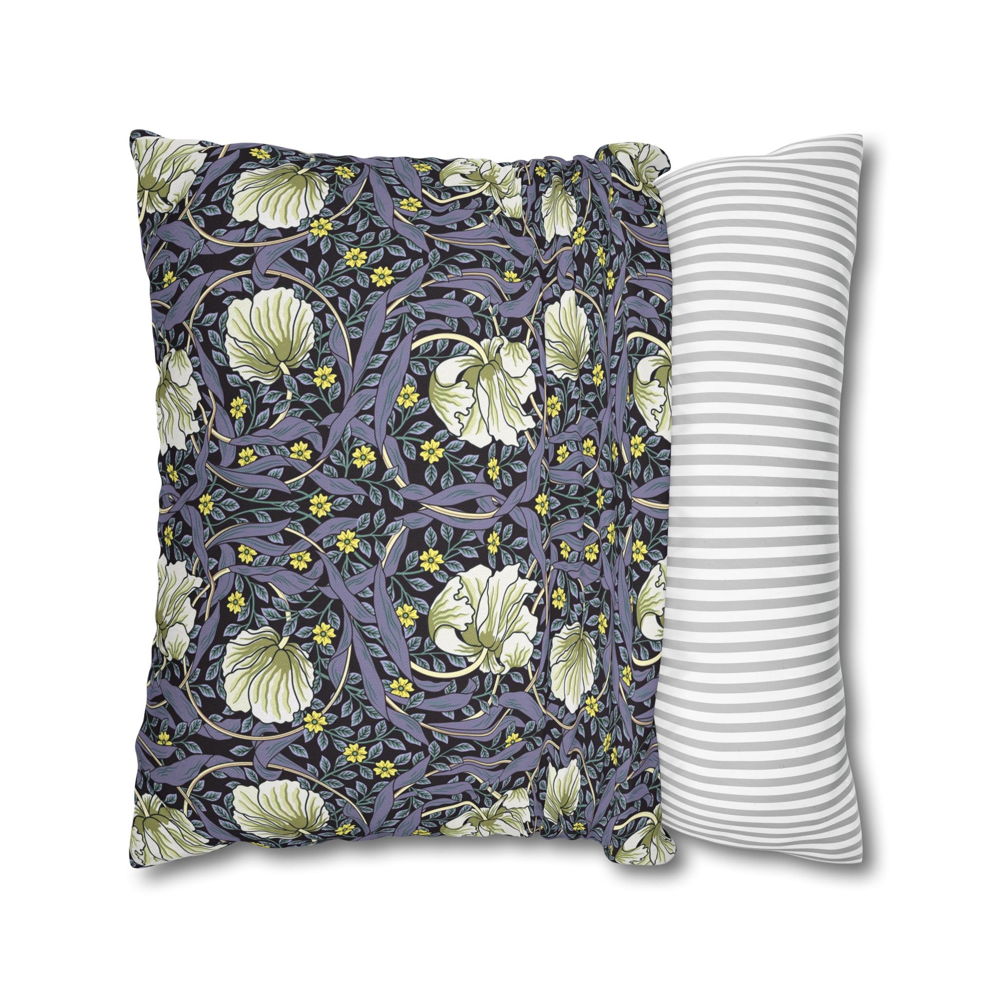 Two pillows, one with floral pattern and one with stripes, on a white background