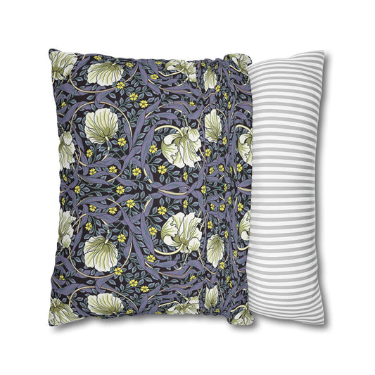 Two pillows, one with floral pattern and one with stripes, on a white background