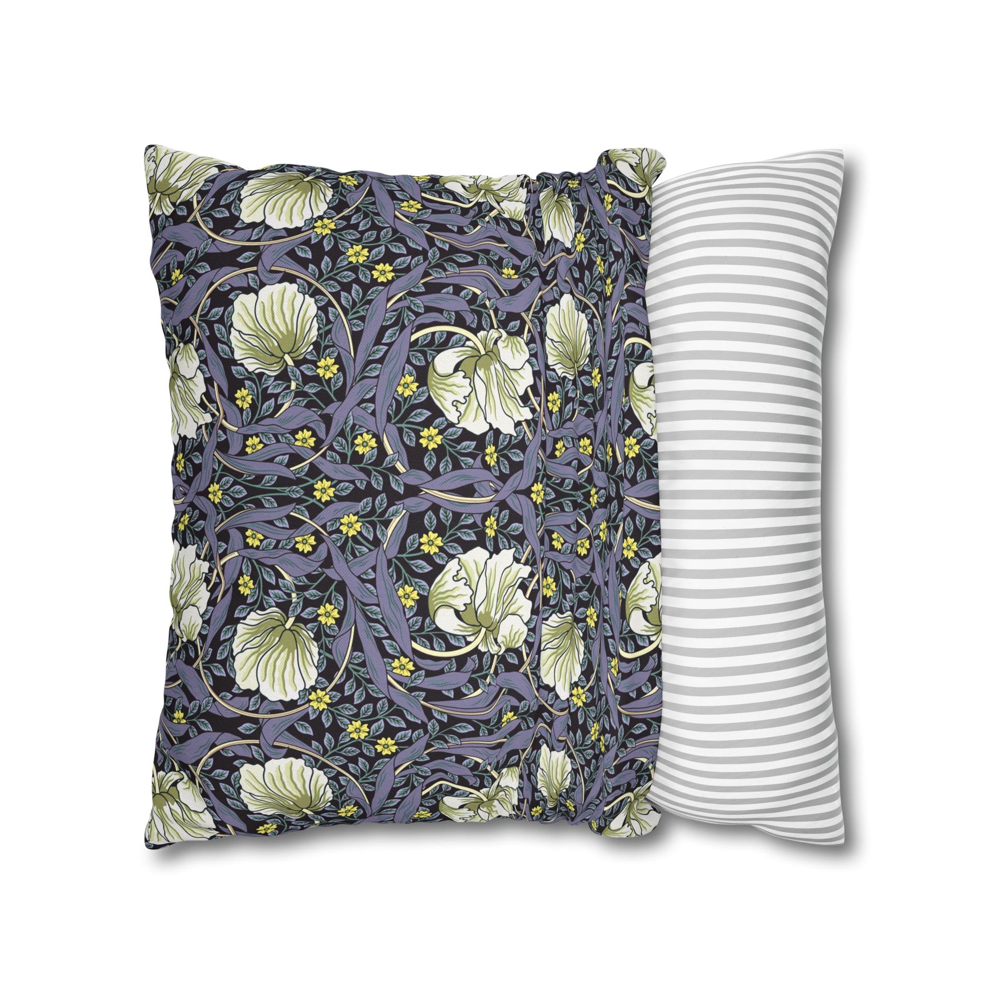 Two pillows, one with floral pattern and one with stripes, on a white background