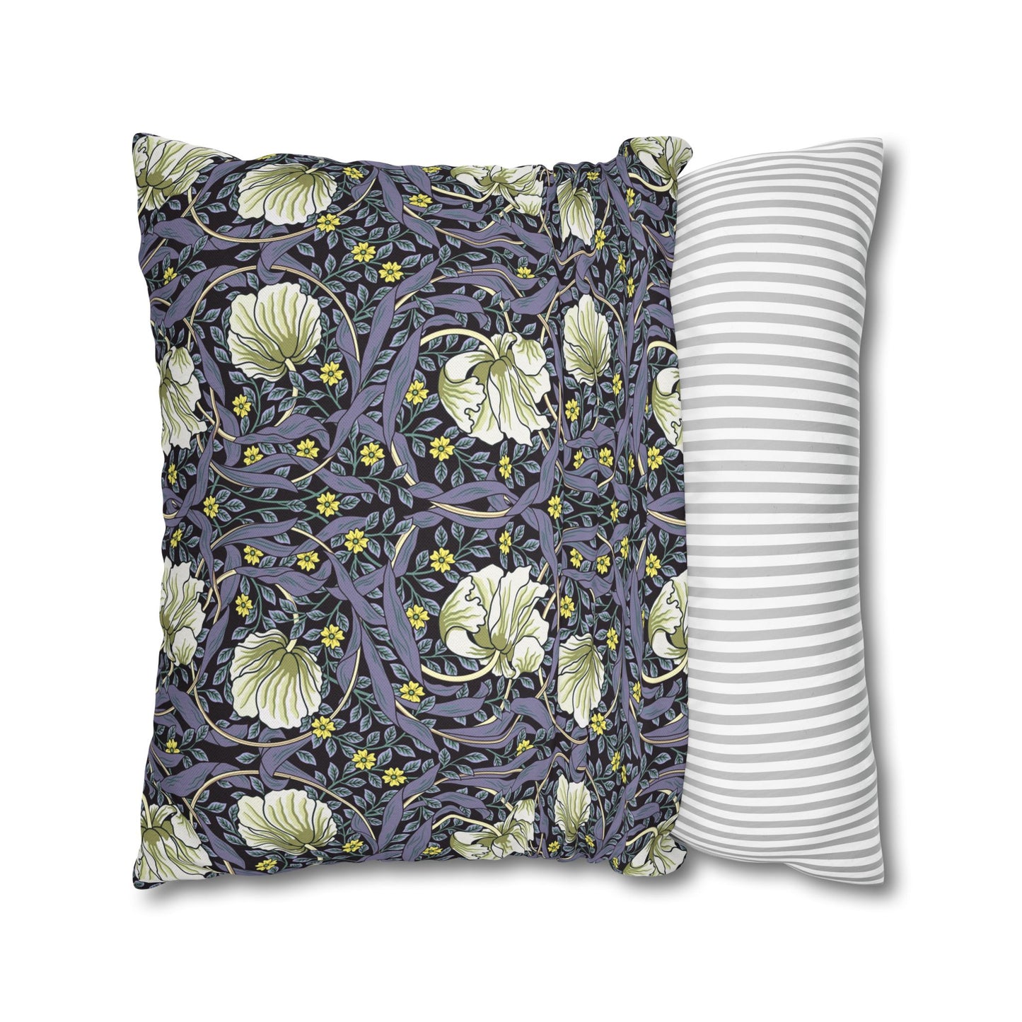 Two pillows, one with floral pattern and one with stripes, on a white background