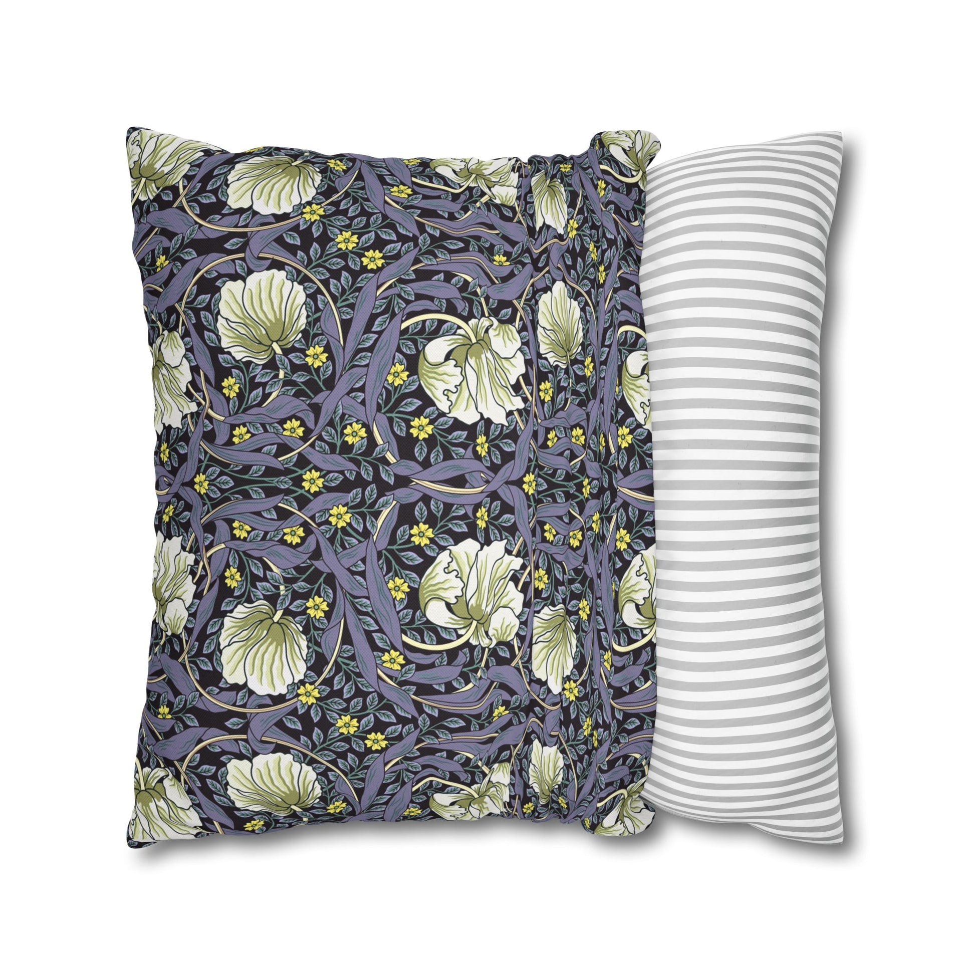 Two pillows, one with floral pattern and one with stripes, on a white background