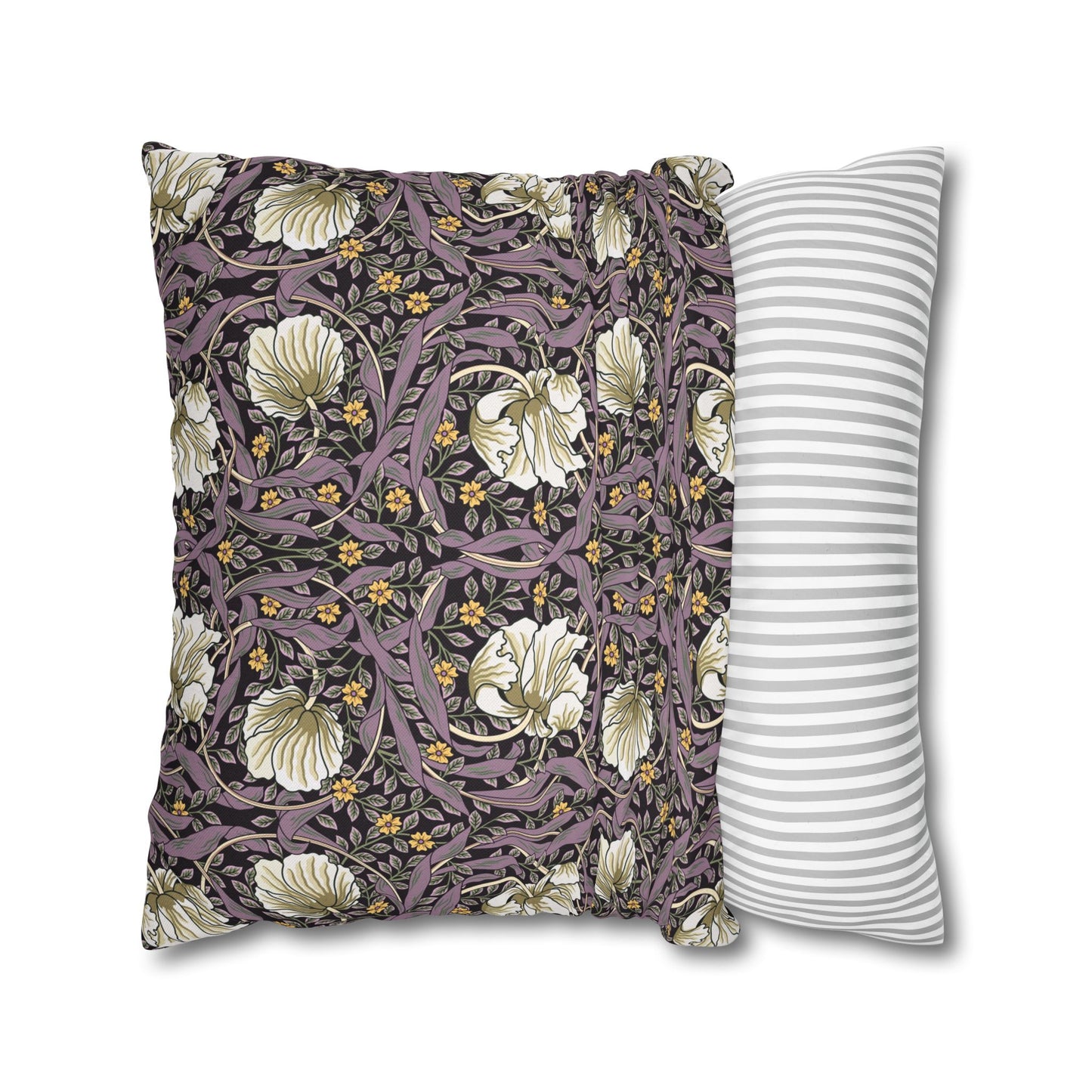 Two pillows, one with floral pattern and one with stripes, on a white background