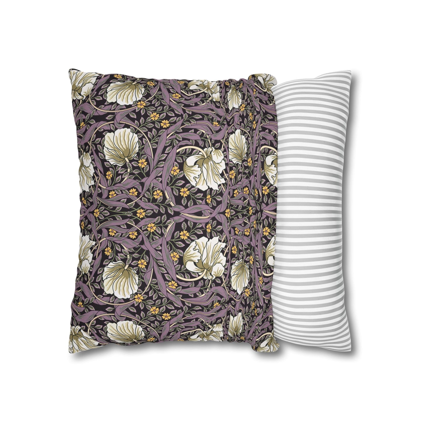 Two pillows, one with floral pattern and one with stripes, on a white background