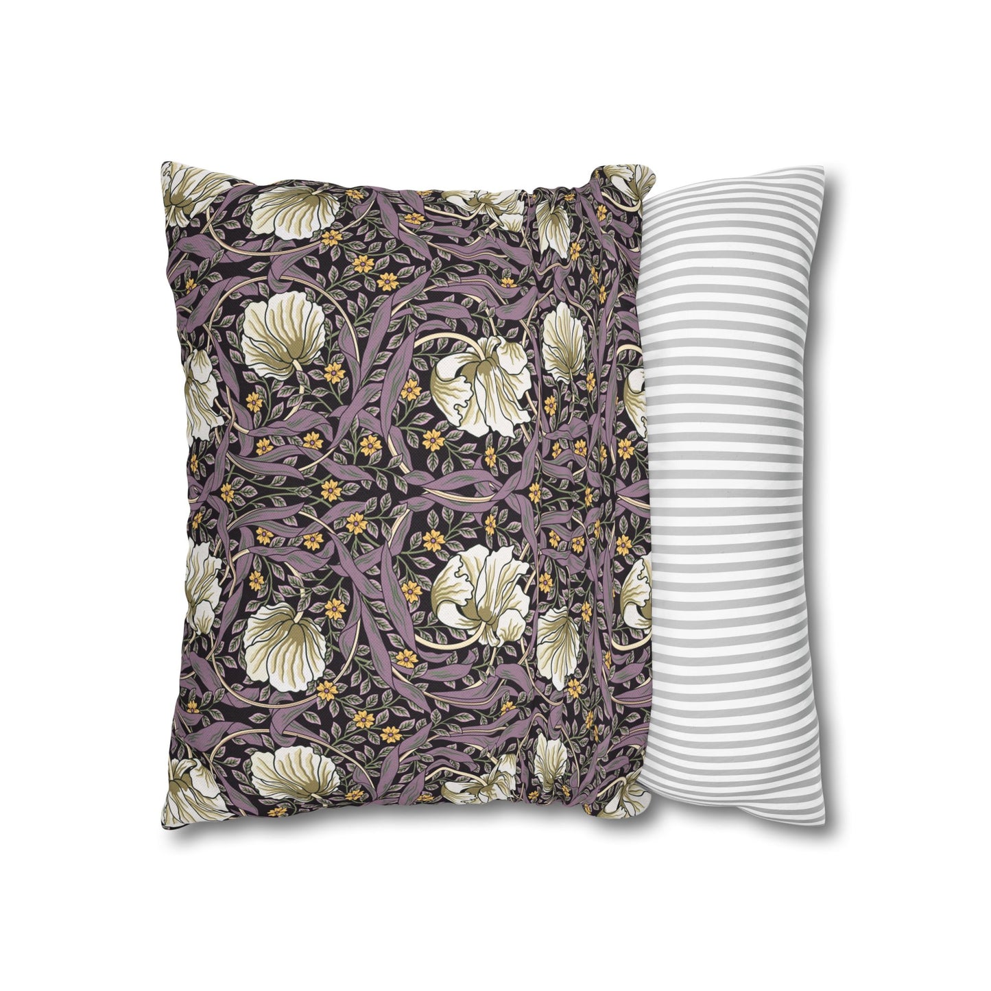 Two pillows, one with floral pattern and one with stripes, on a white background