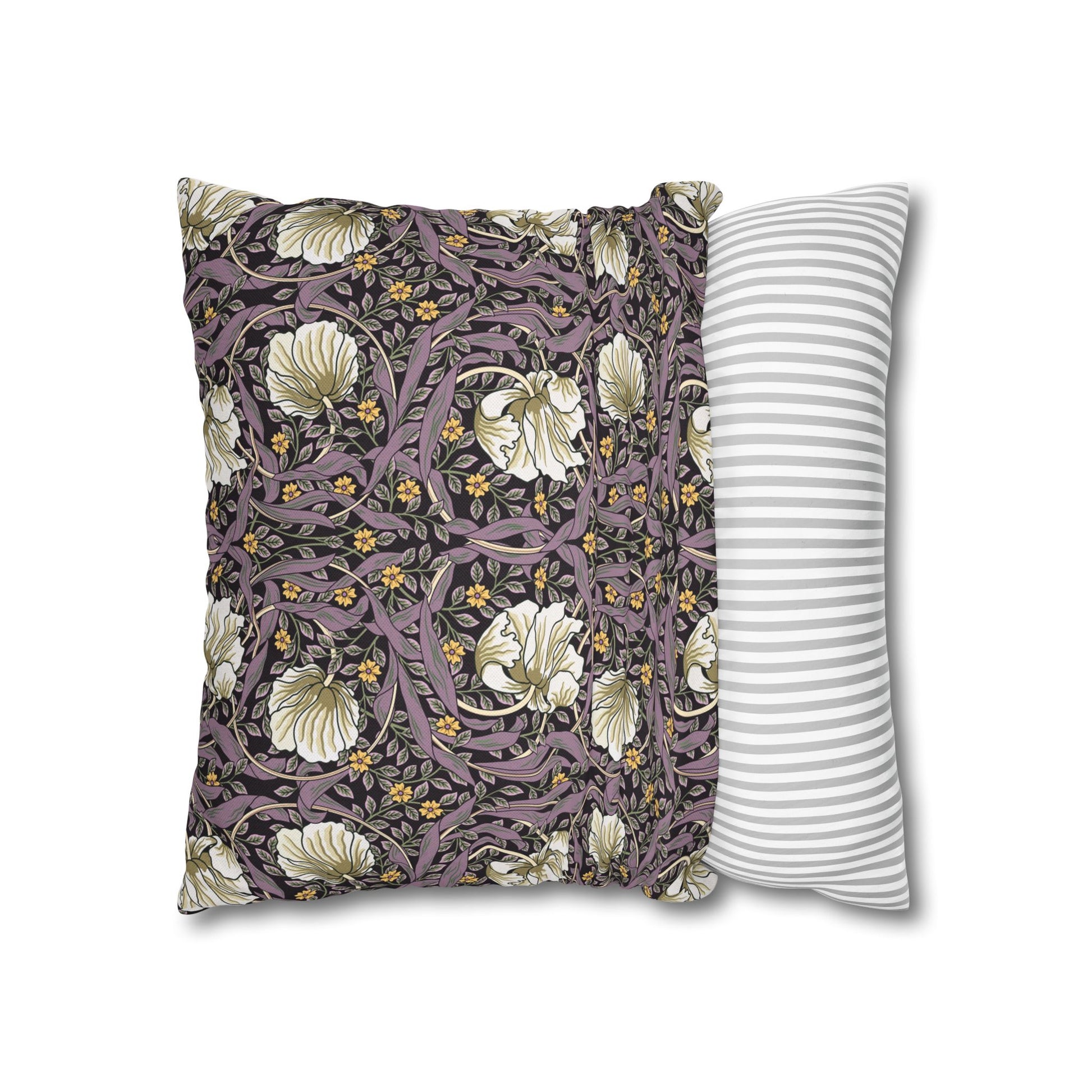 Two pillows, one with floral pattern and one with stripes, on a white background