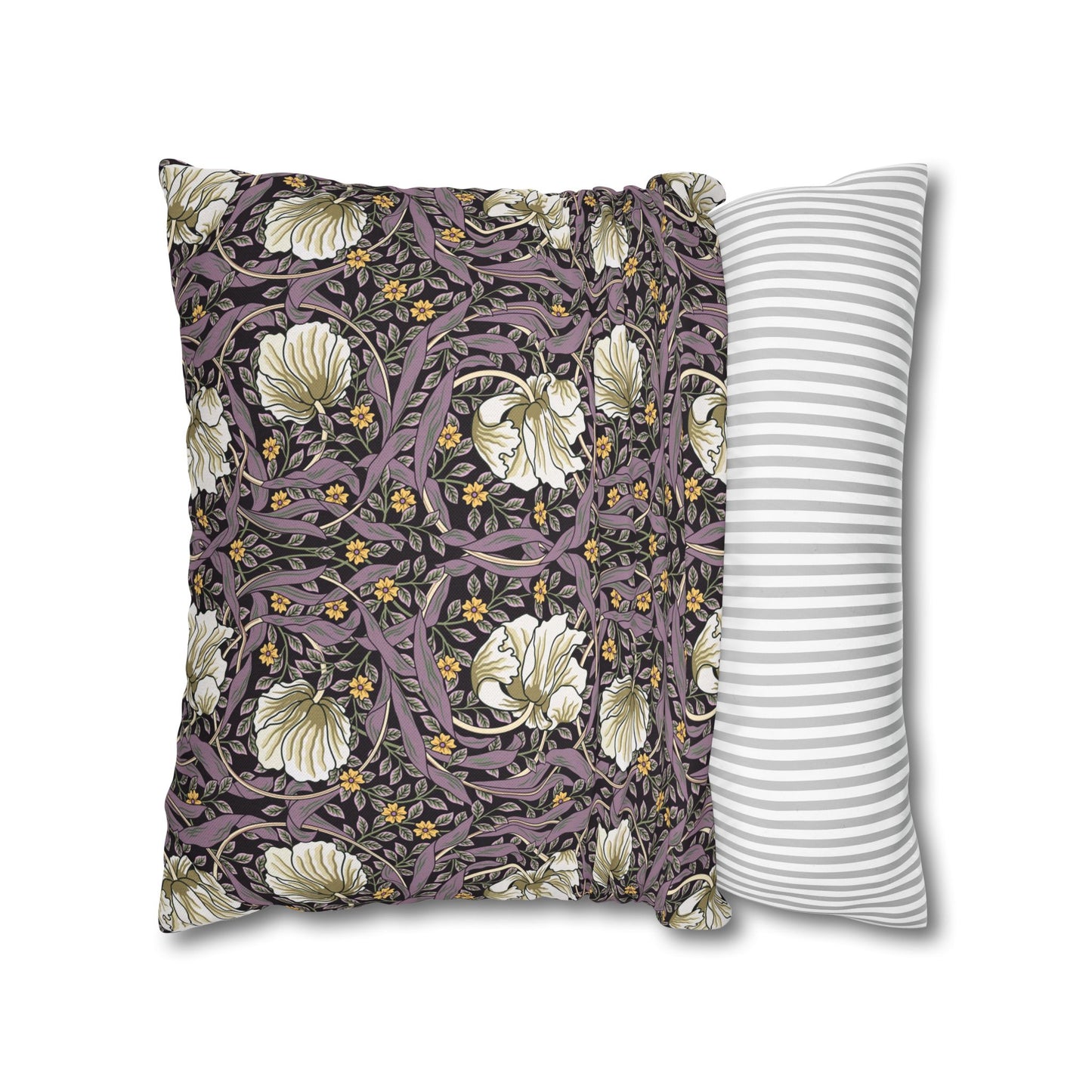 Two pillows, one with floral pattern and one with stripes, on a white background