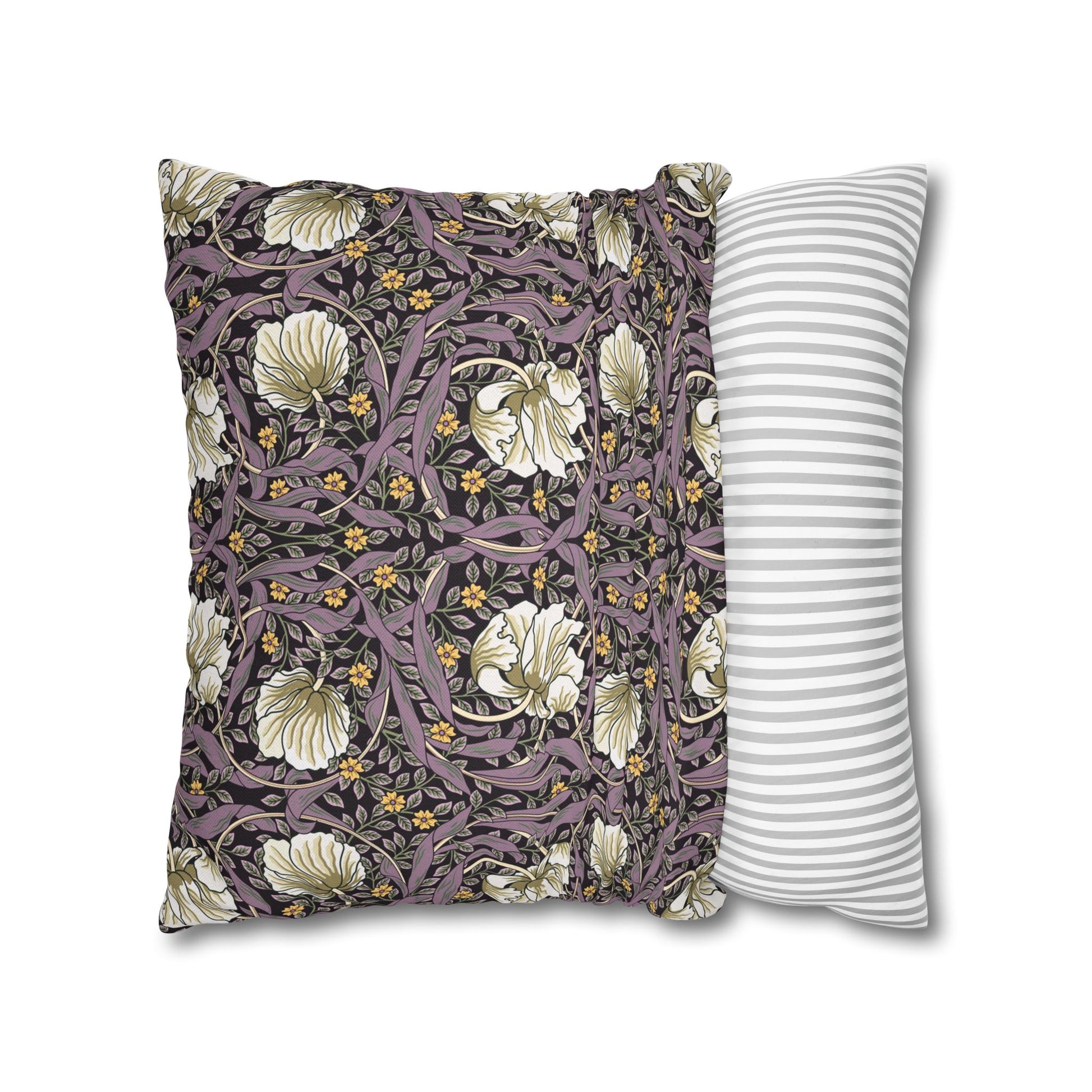 Two pillows, one with floral pattern and one with stripes, on a white background