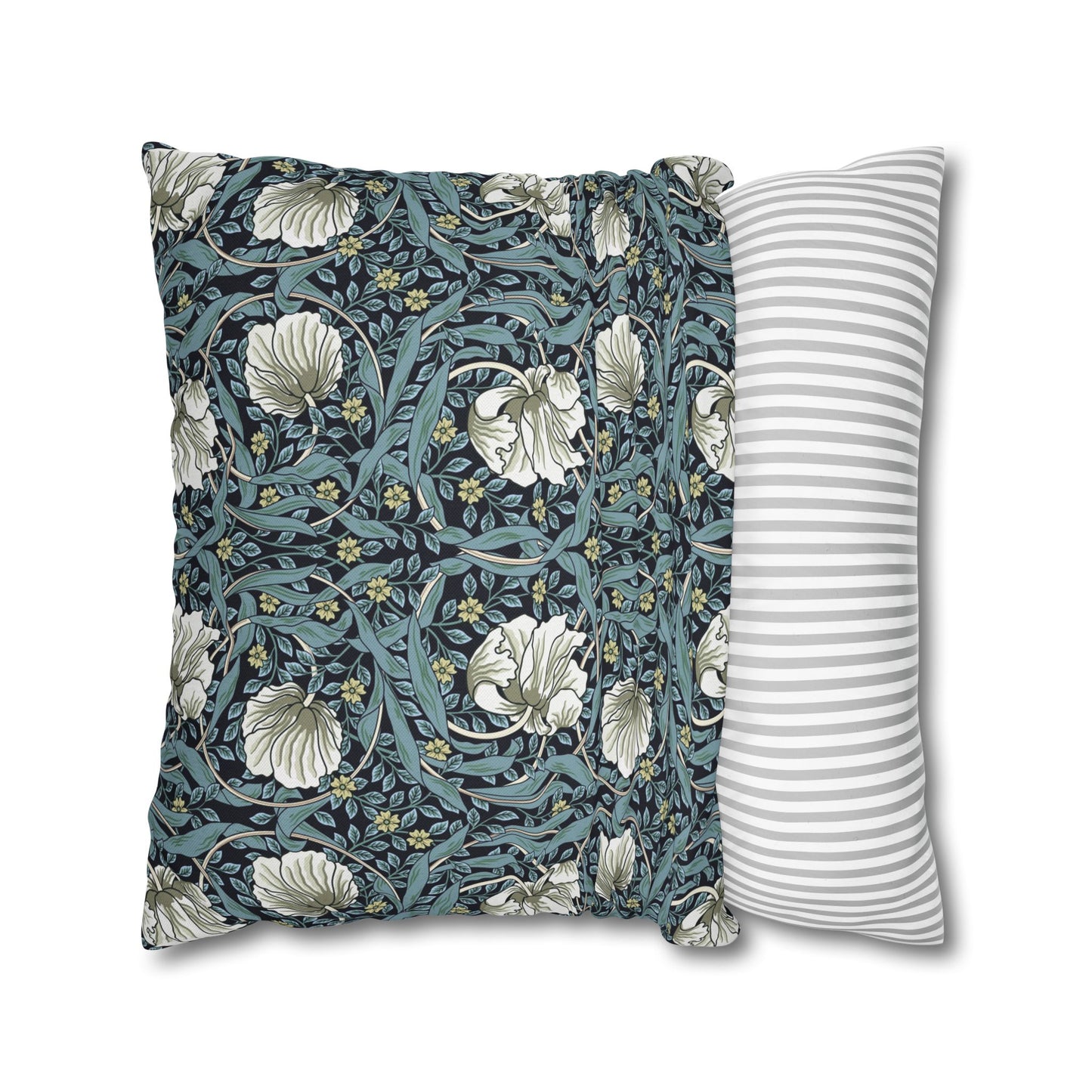 Two pillows, one with floral pattern and one with stripes, on a white background