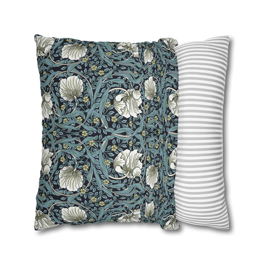 Two pillows, one with floral pattern and one with stripes, on a white background