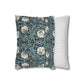 Floral-patterned pillow and striped pillow on a white background