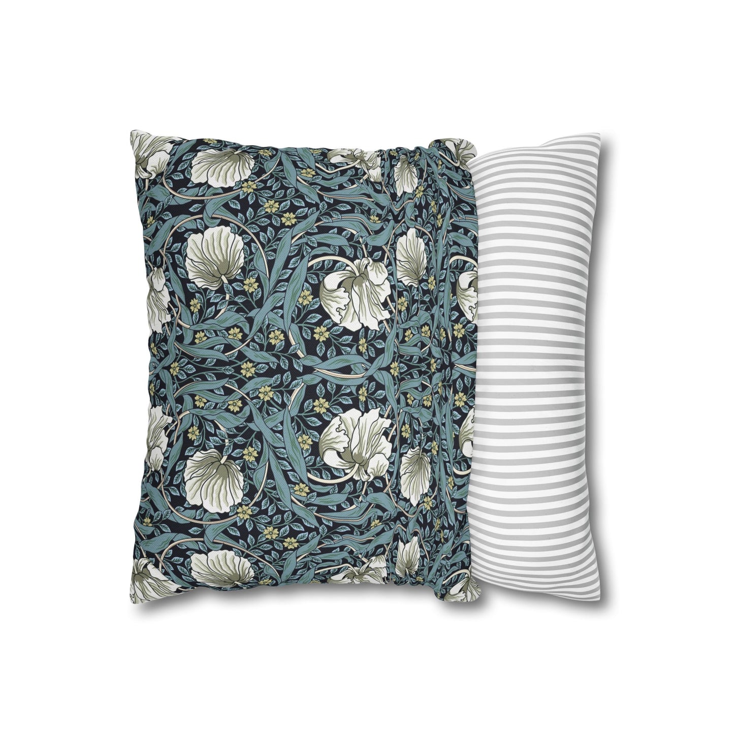 Floral-patterned pillow and striped pillow on a white background