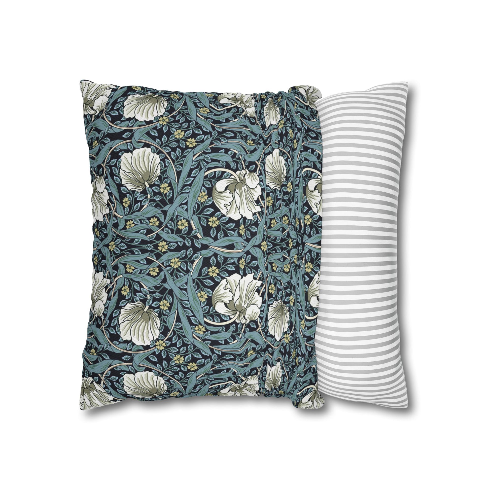 Floral-patterned pillow and a striped pillow on a white background