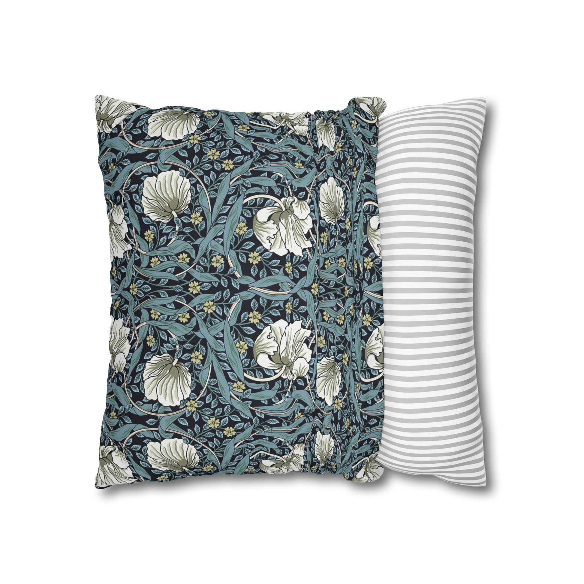 Two pillows, one with floral pattern and one with stripes, on a white background