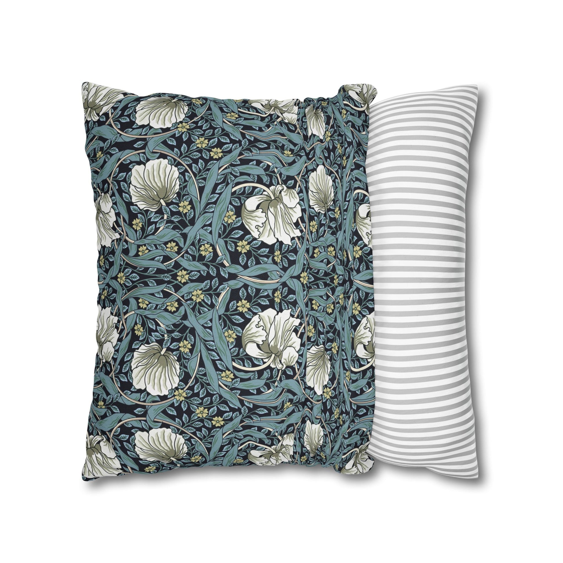 Two pillows, one with floral pattern and one with stripes, on a white background