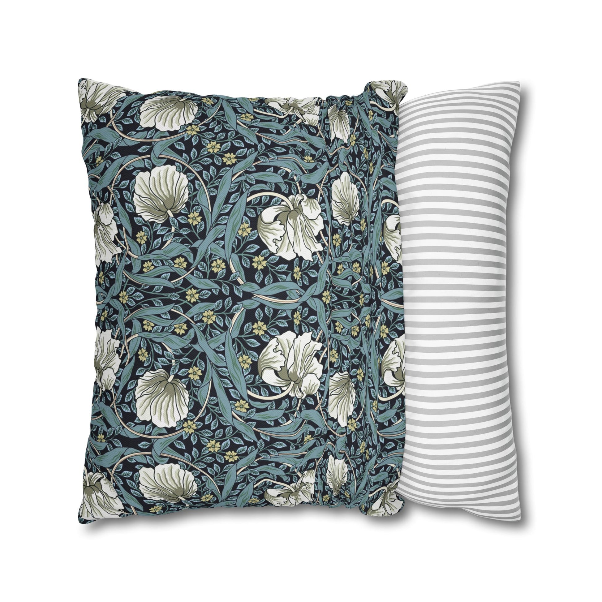 Two pillows, one with floral pattern and one with stripes, on a white background