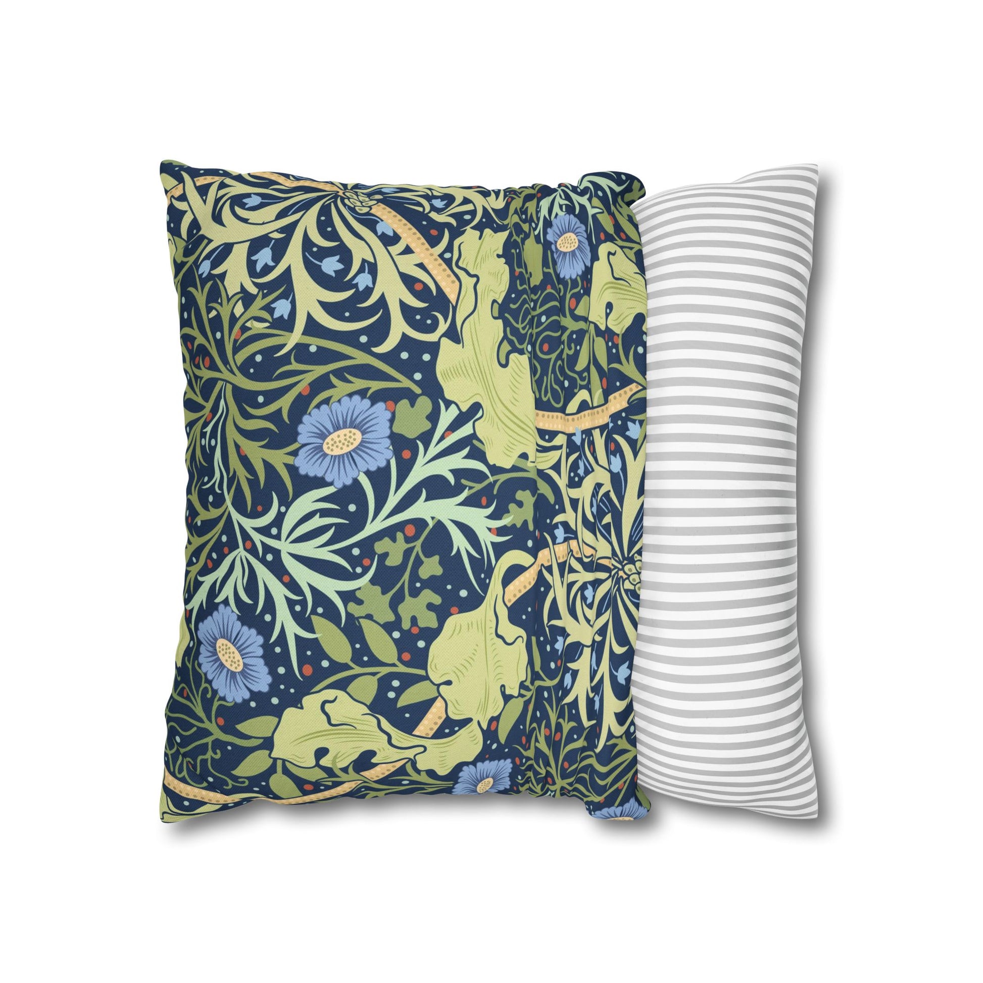 Two pillows, one with a floral pattern and the other with a striped pattern, on a white background.