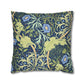Decorative pillow with floral and elephant pattern on a white background