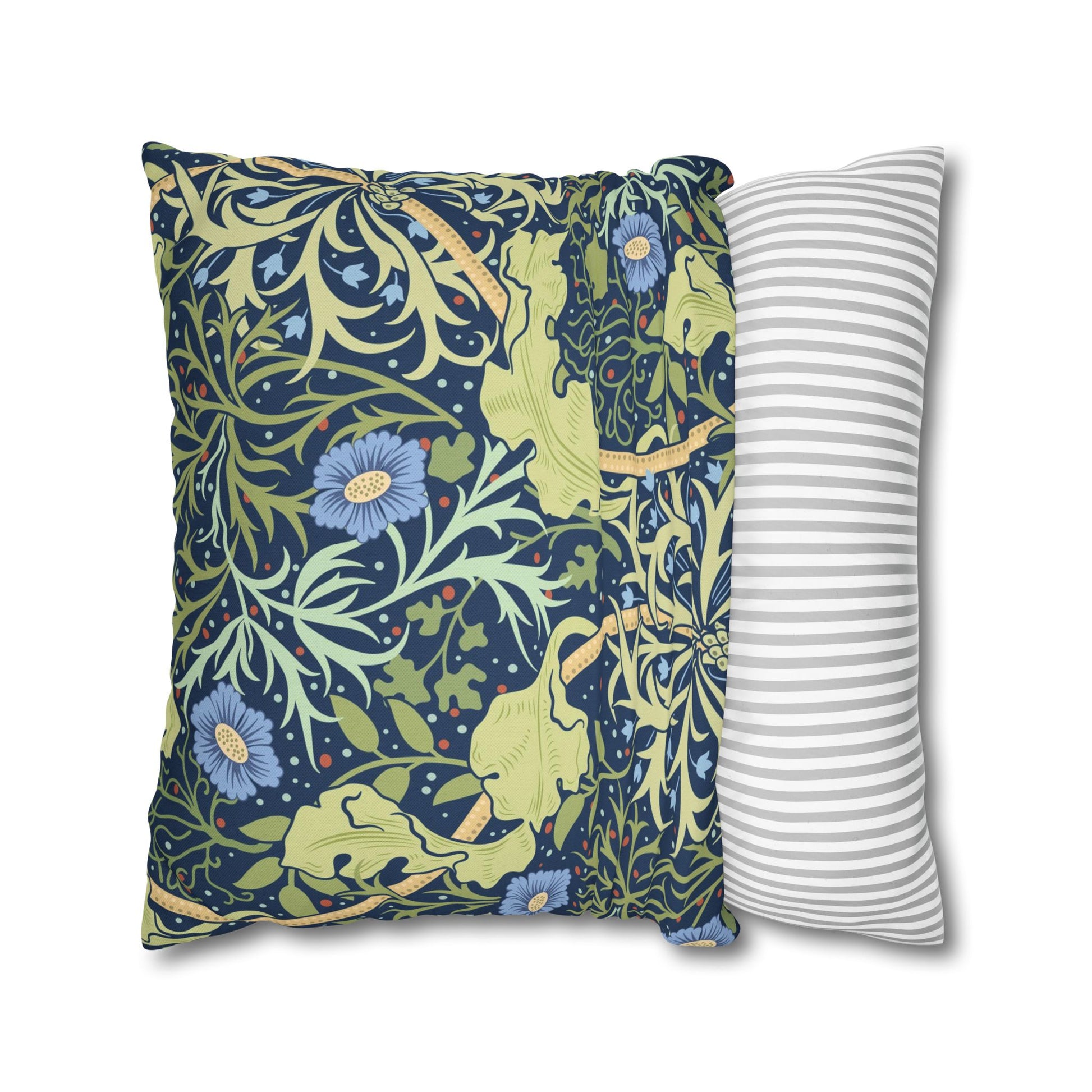 Two pillows, one with floral pattern and one with stripes, on a white background