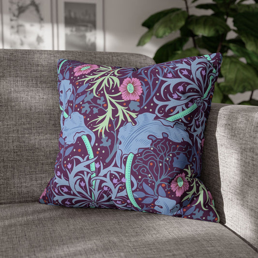 Decorative pillow with floral pattern on a gray sofa