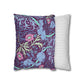 Two pillows, one with a floral and animal pattern and the other with a striped design, on a white background.