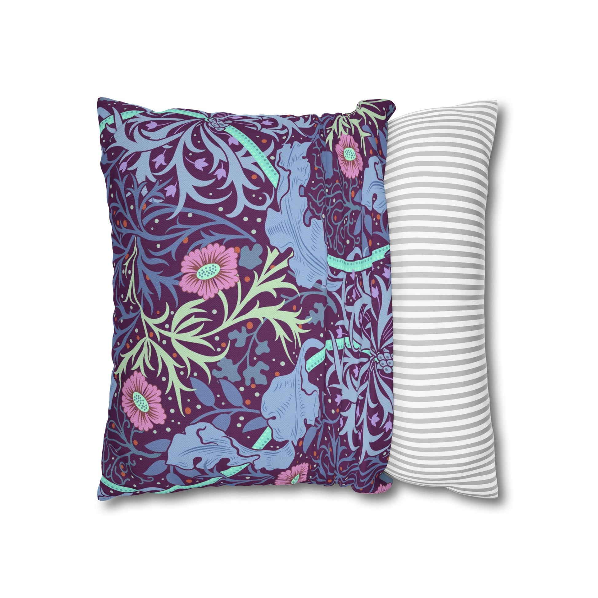 Two pillows, one with a floral pattern and the other with a striped pattern, on a white background.
