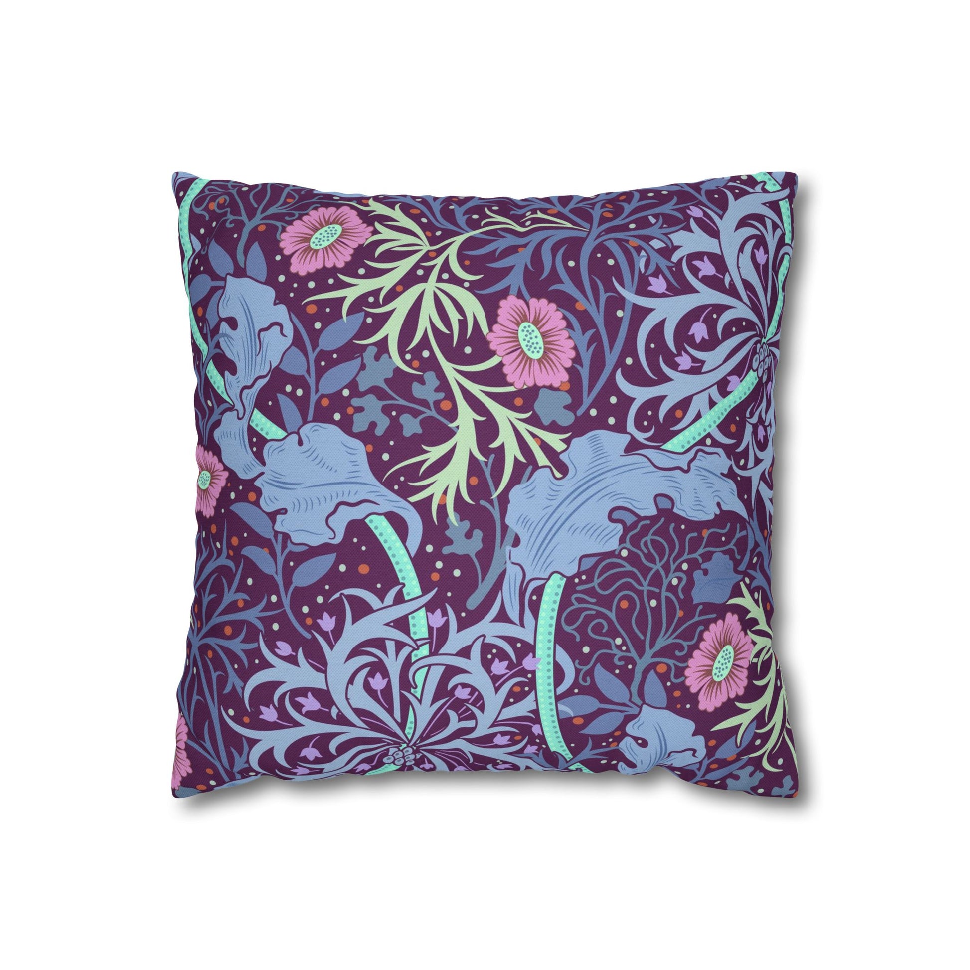 Decorative pillow with floral and elephant pattern on a white background