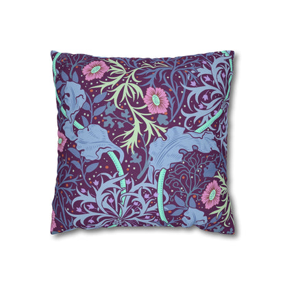Decorative pillow with floral and elephant pattern on a white background