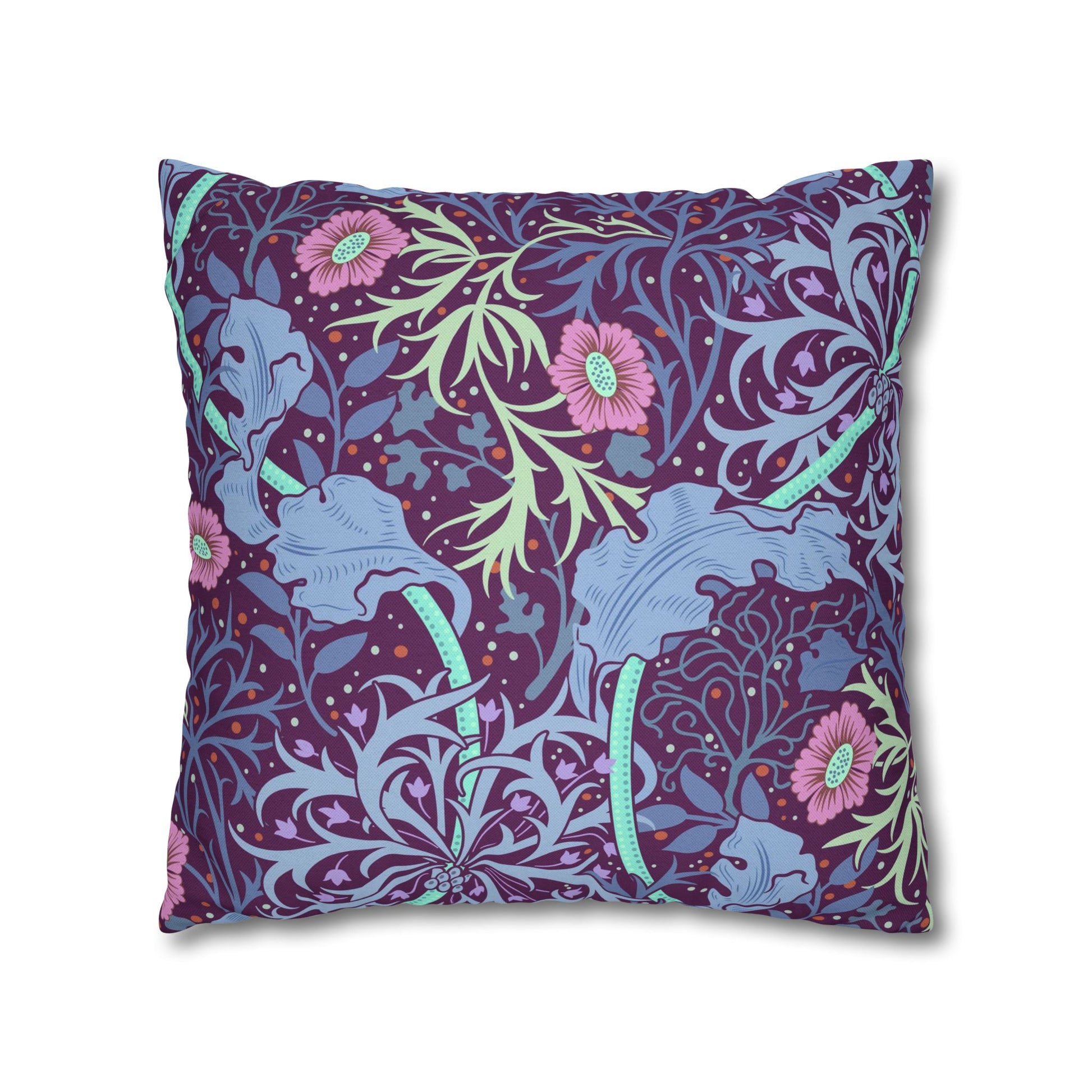 Decorative pillow with floral and abstract design on a white background