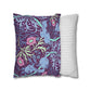 Two pillows, one with floral pattern and one with stripes, on a white background