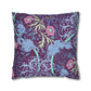 Decorative pillow with floral and elephant pattern on a white background