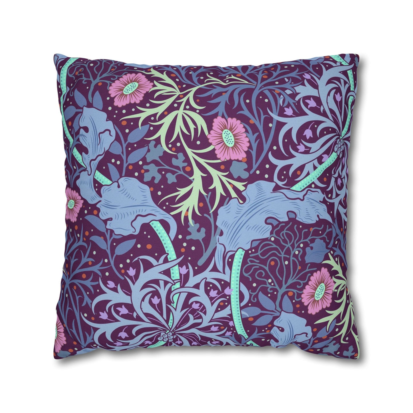 Decorative pillow with floral and elephant pattern on a white background