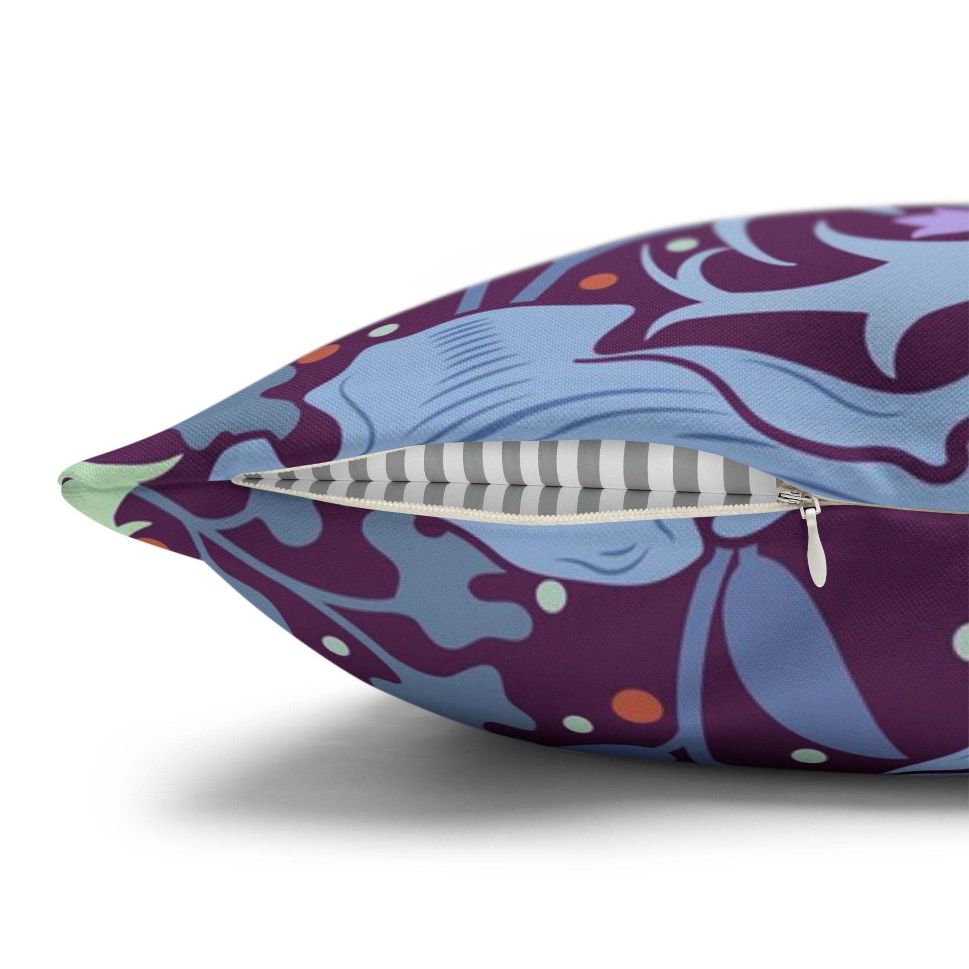 Decorative pillow with a colorful floral pattern on a white background