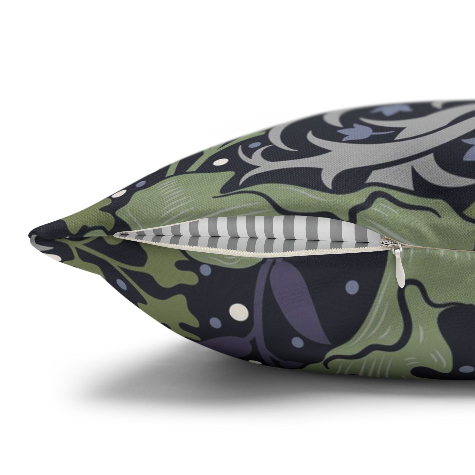 Decorative pillow with a green and purple pattern on a white background