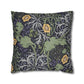 Decorative pillow with floral and dragon design on a white background