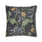 Decorative pillow with floral and leaf pattern on a white background