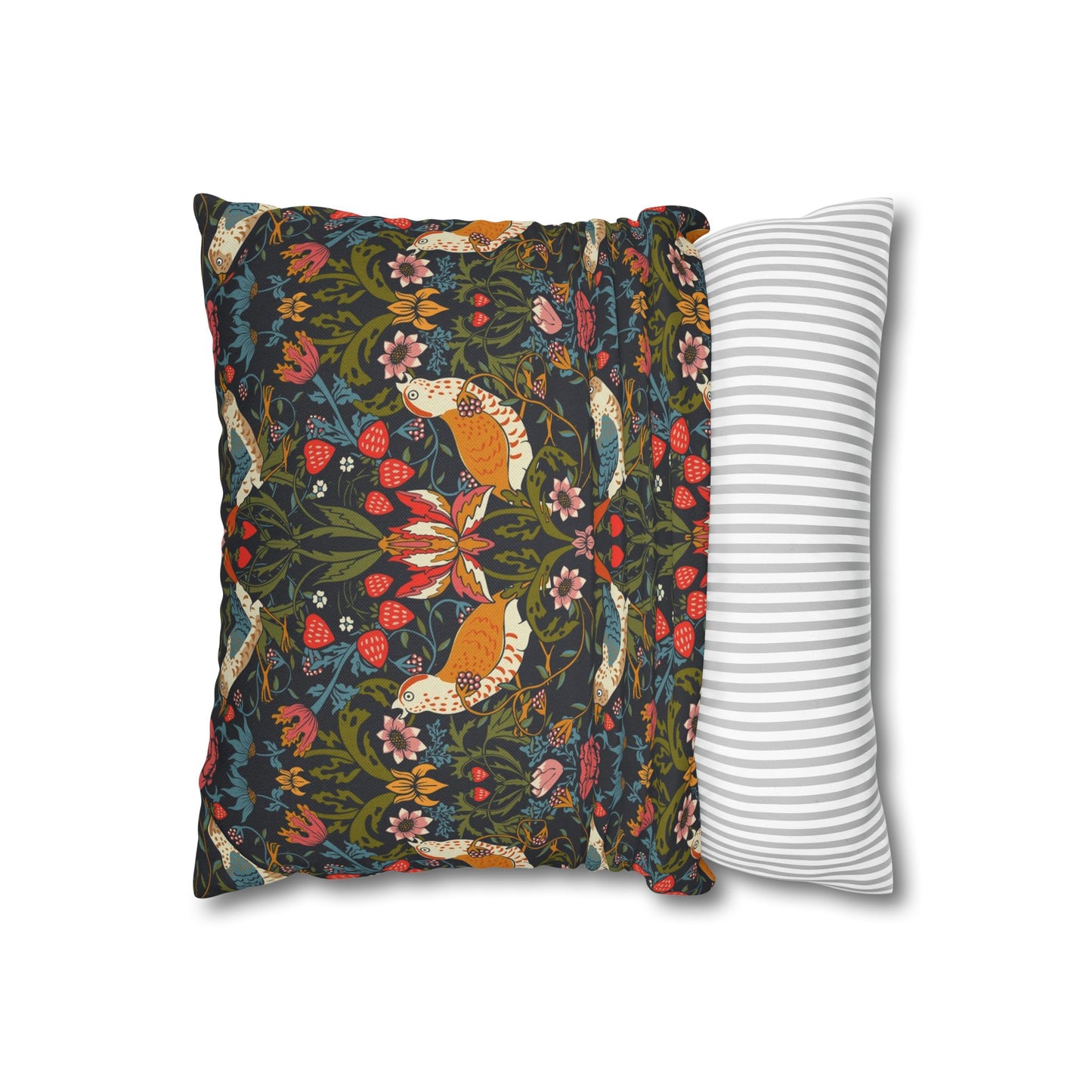 Decorative pillow with fox and floral pattern next to a striped pillow on a white background