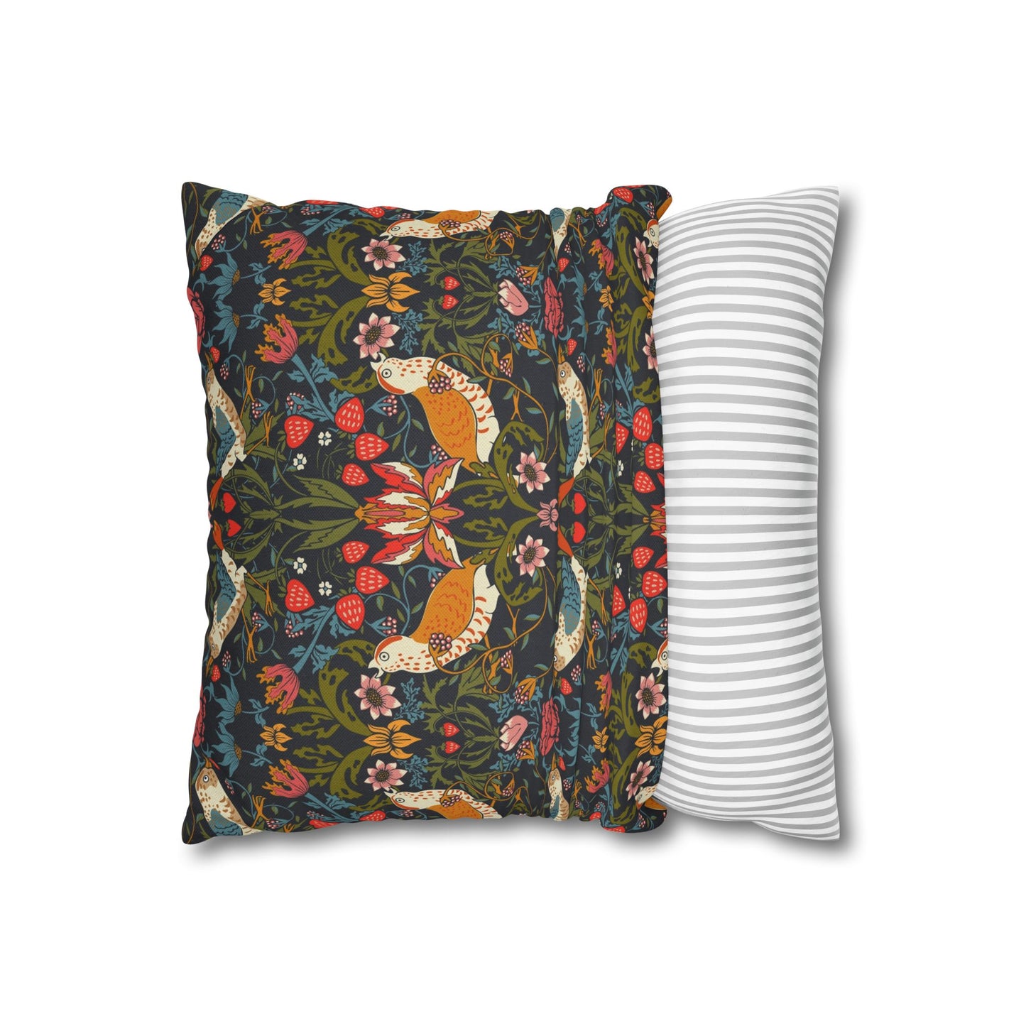 Decorative pillow with fox and floral pattern next to a striped pillow on a white background