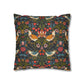 Decorative pillow with floral and bird pattern on a dark background