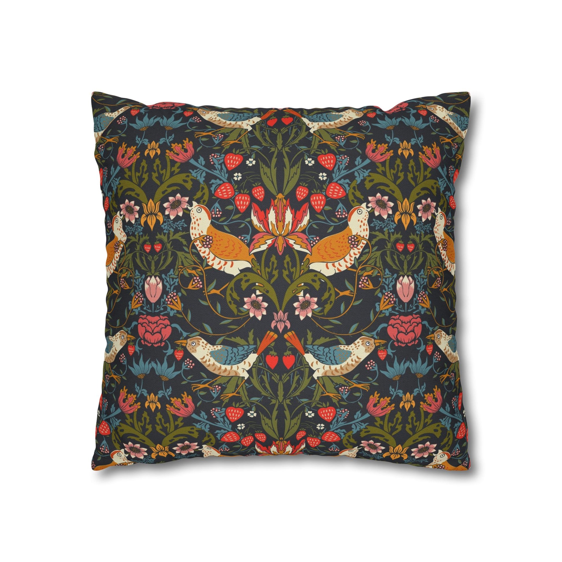 Decorative pillow with floral and bird pattern on a dark background