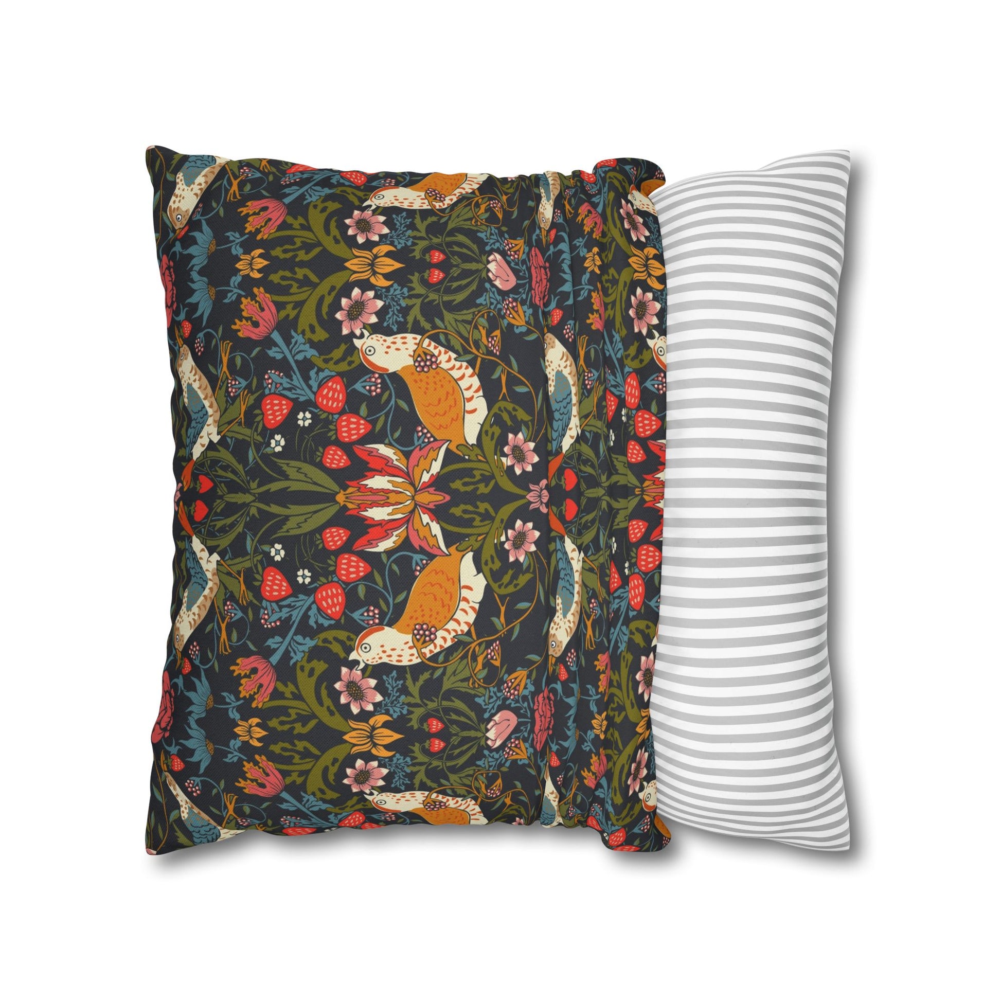 Two pillows, one with a colorful floral and bird design and the other with a white and gray striped pattern, on a white background.