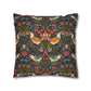 Decorative pillow with a floral and bird pattern on a white background