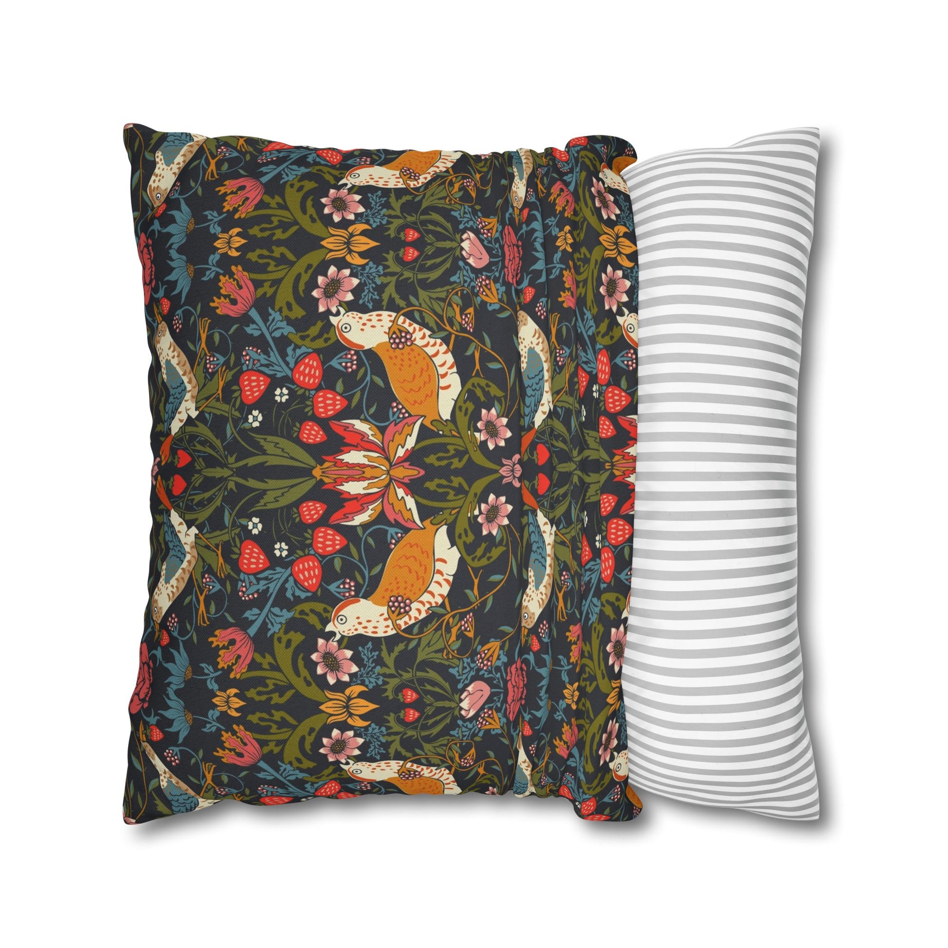 Two pillows, one with a floral and bird pattern and the other with a striped pattern, on a white background.