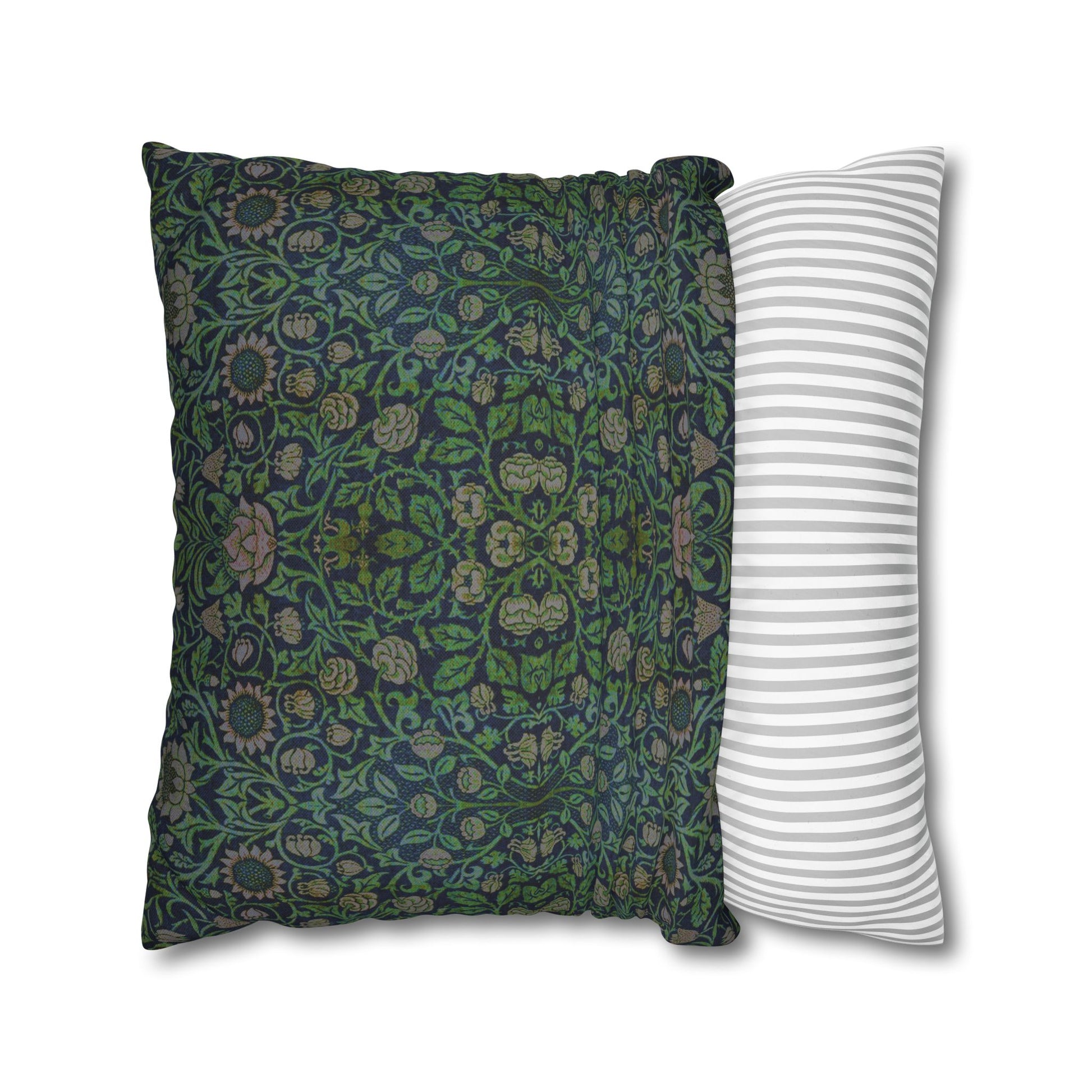 Two pillows, one with a green floral pattern and the other with white stripes, on a white background.