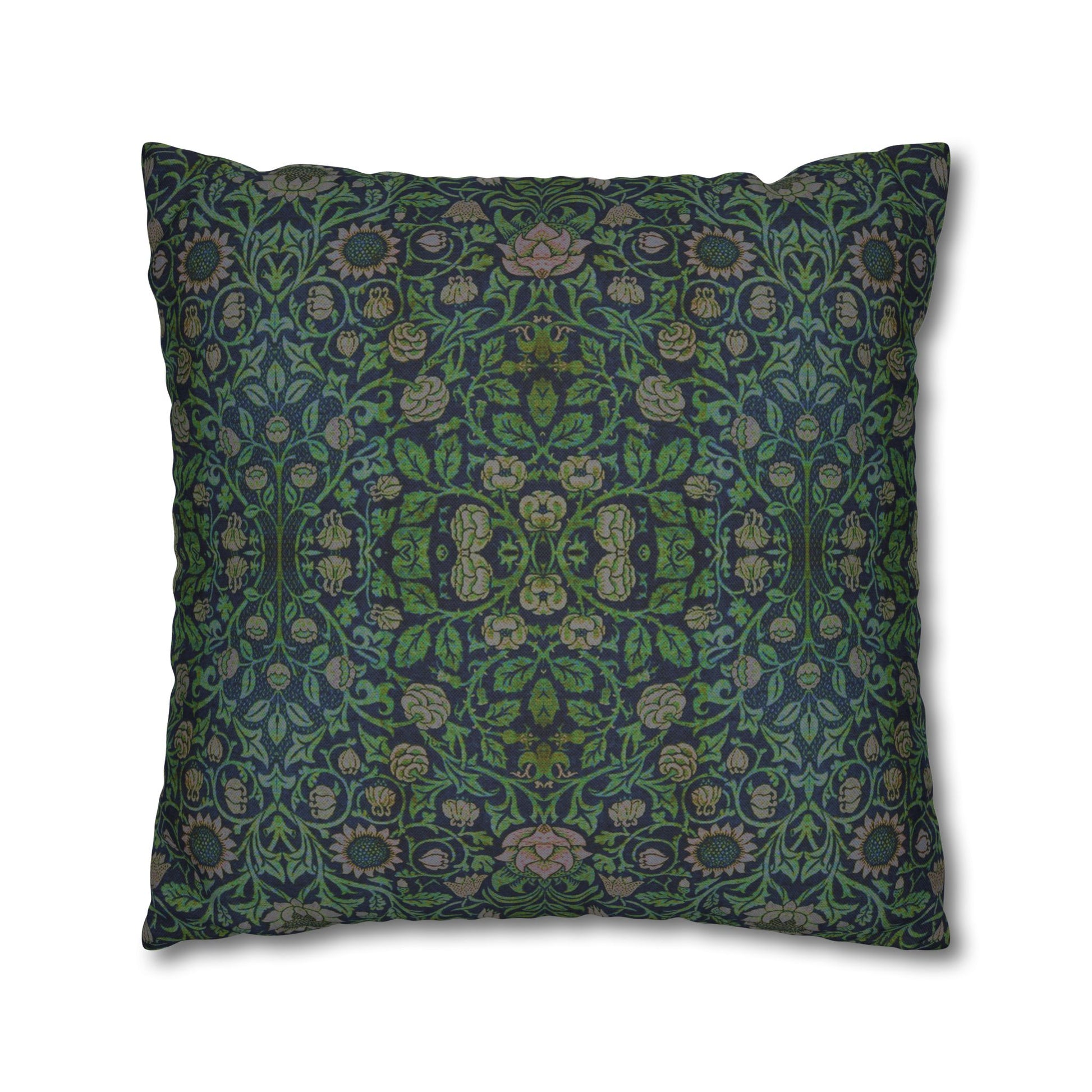 Decorative pillow with intricate green and blue pattern on a white background