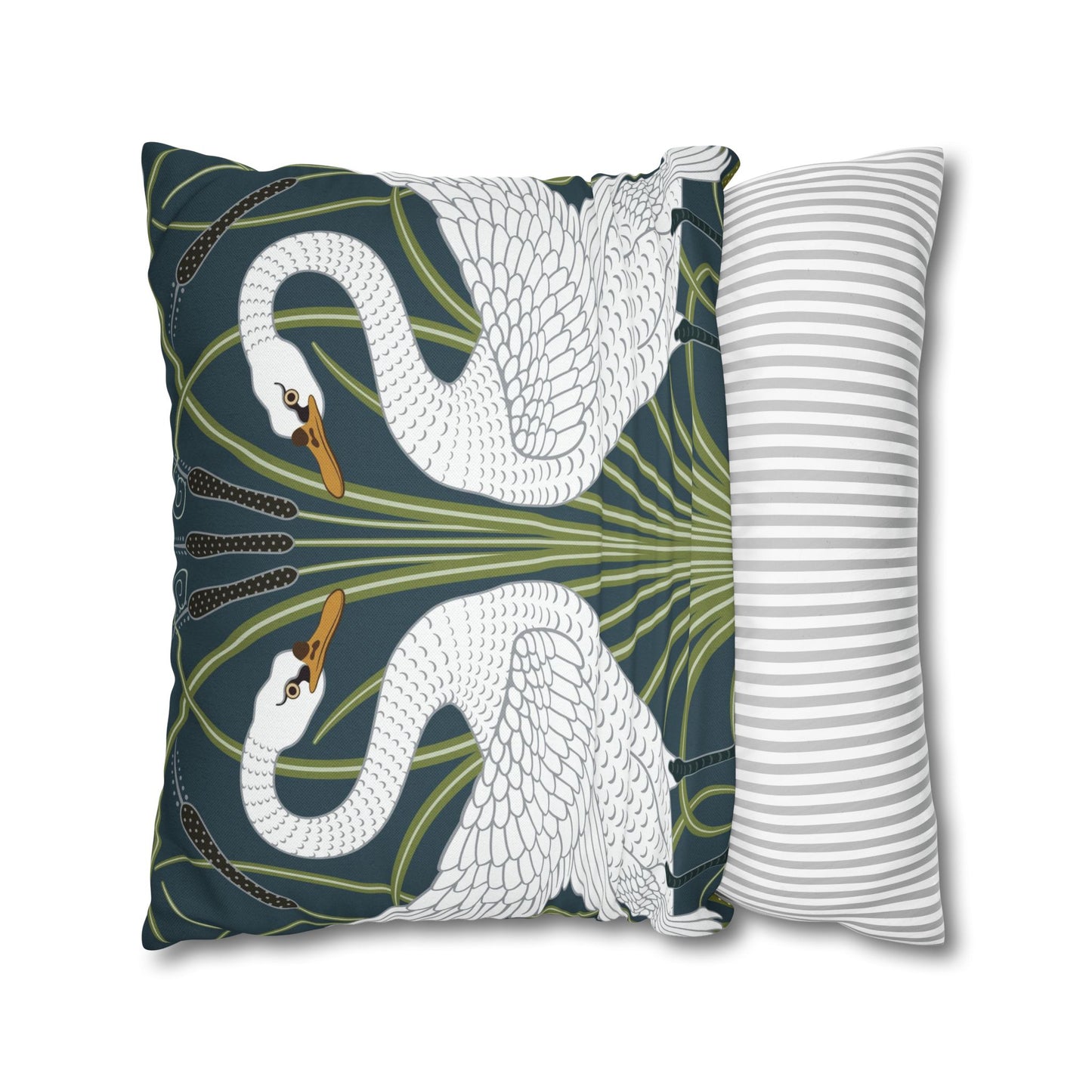 Decorative pillow with swan design next to a striped pillow on a white background