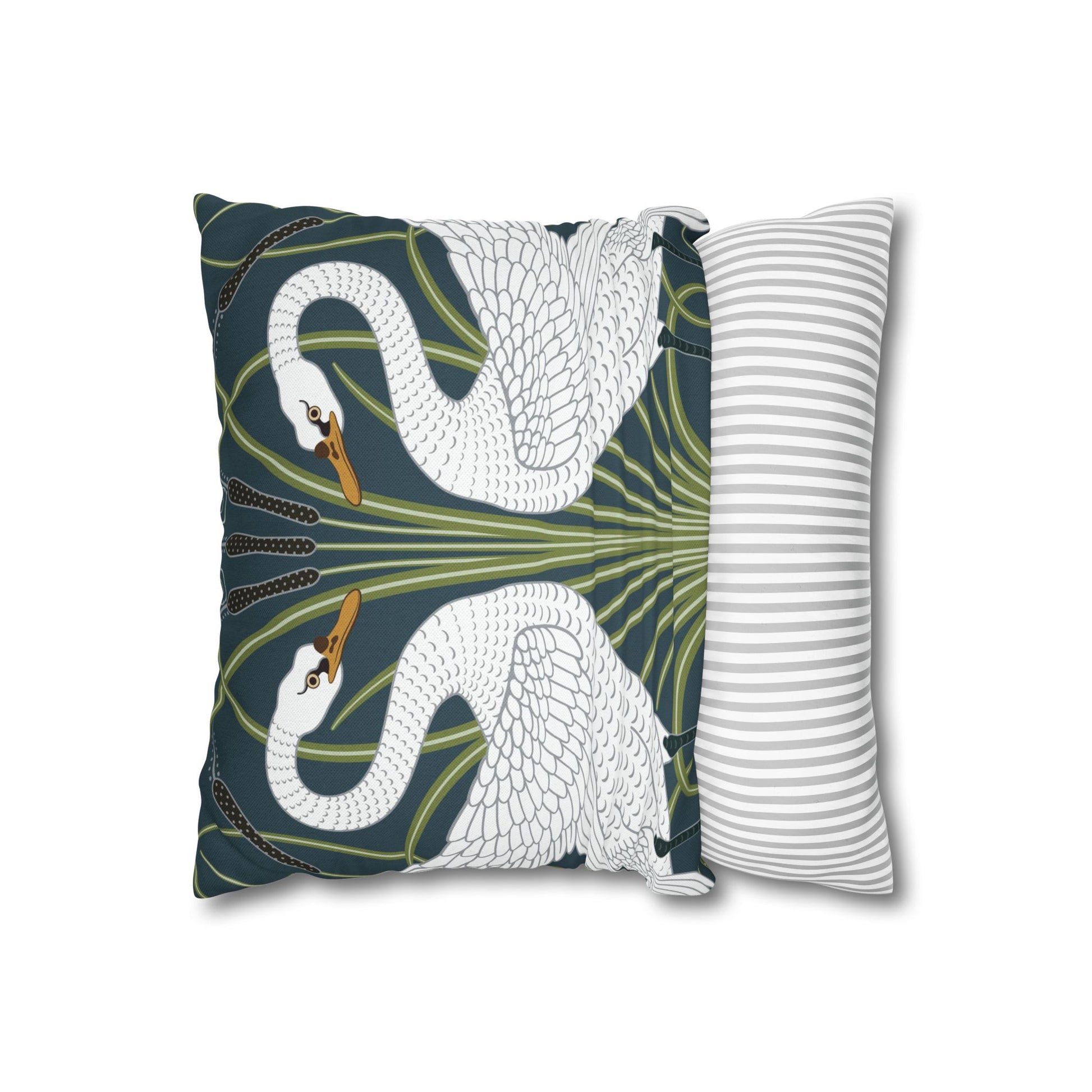 Decorative pillow with swan design on a white background
