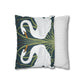 Decorative pillow with swan design on one side and striped pattern on the other, on a white background.